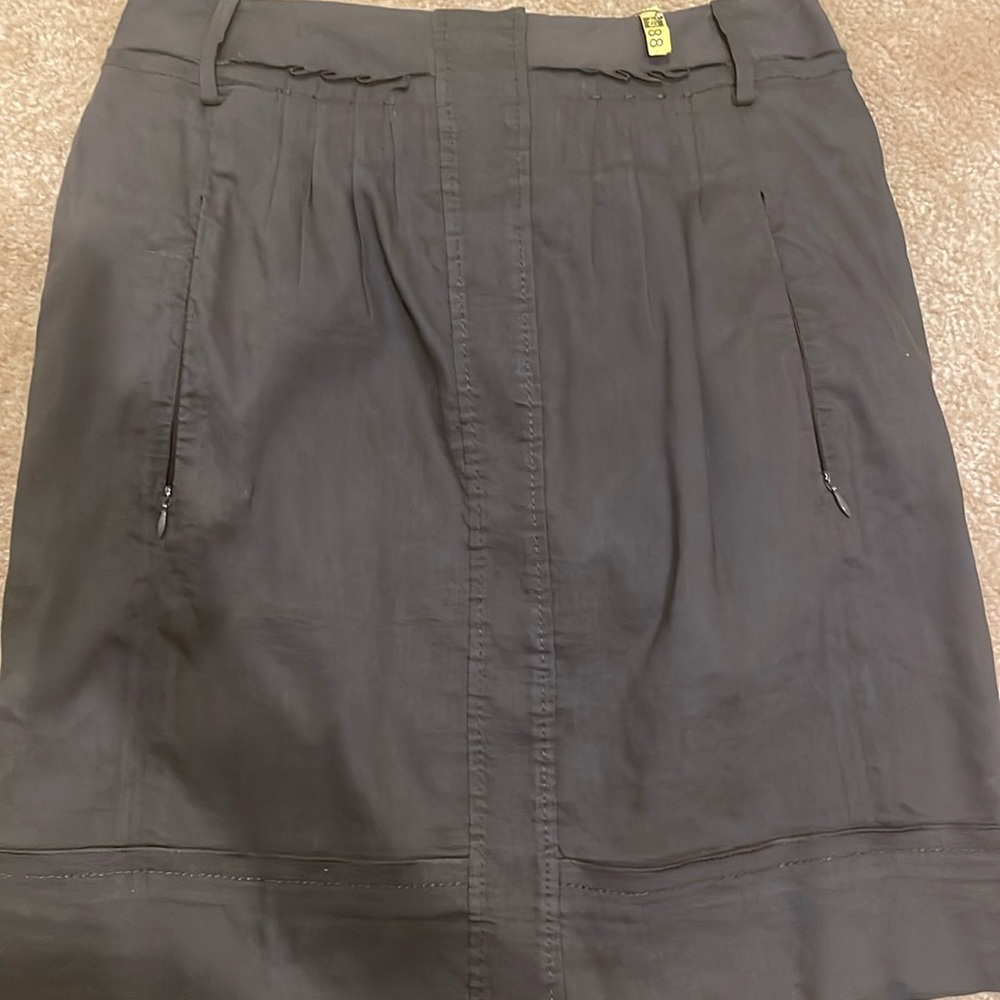 Casual Elie Tahari skirt fits at knee.